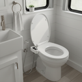 Clean Camper RV bidet attachment installed on an RV toilet
